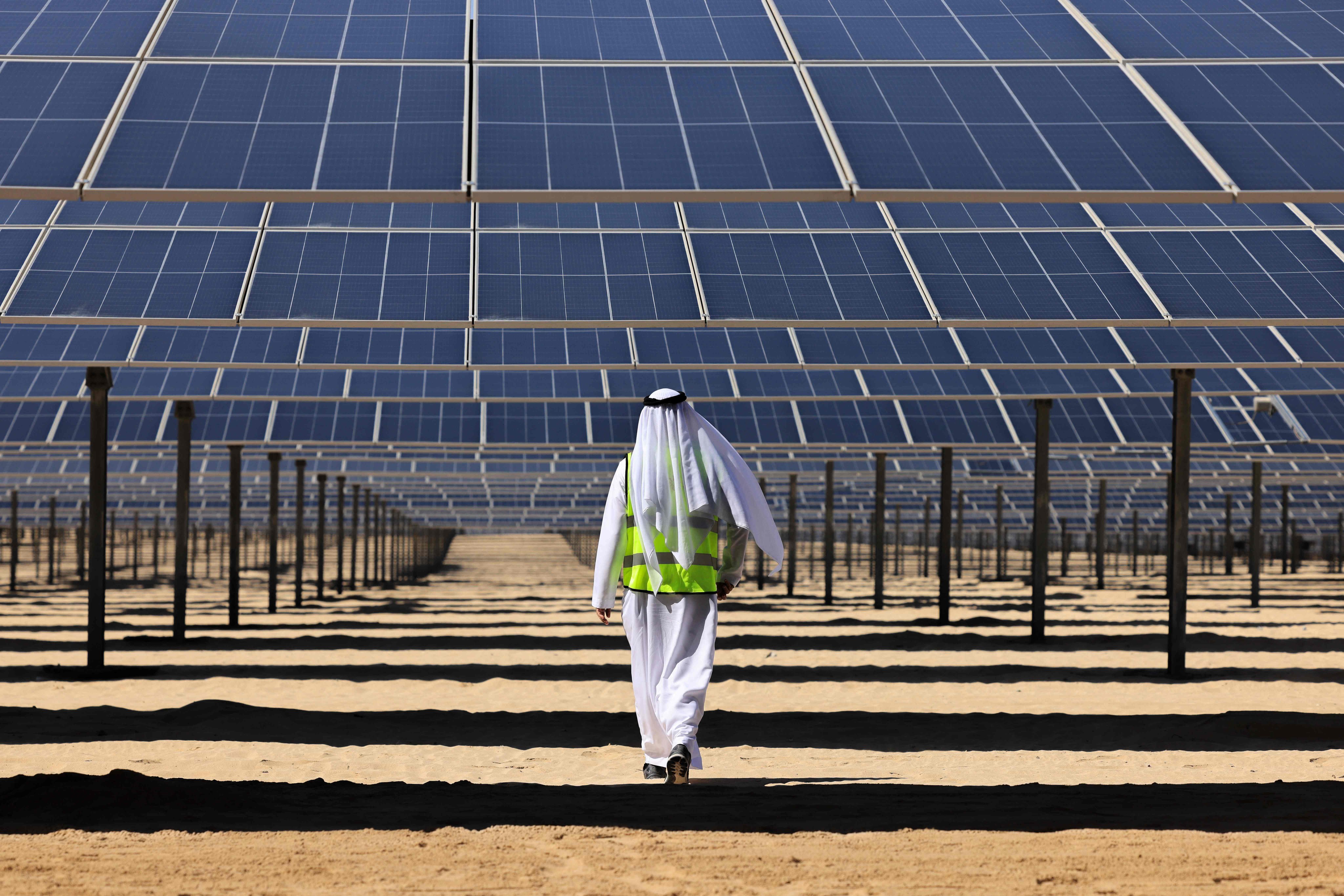Solar panel infrastructure in UAE desert landscape